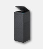 Front view of the dark grey Coway Noble Air Purifier (AP-2021A) with its top lid open, showcasing the award-winning architectural tower design and smart air circulation system.