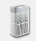 Front view of the white Coway AP-3018B Ultra Air Purifier featuring a perforated dual-side suction grill and a circular LED air quality indicator.