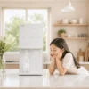 Coway CHPI-7520L MyCup ice water purifier in white, featuring a slim countertop design with dual cooling system in a cozy home kitchen.