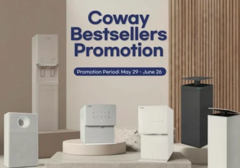 Coway Bestsellers Promotion feature banner displaying a modern home appliance showroom with premium white and charcoal gray water purifiers, air purifiers, and a bidet next to the promotion title and period (May 29 - June 26).
